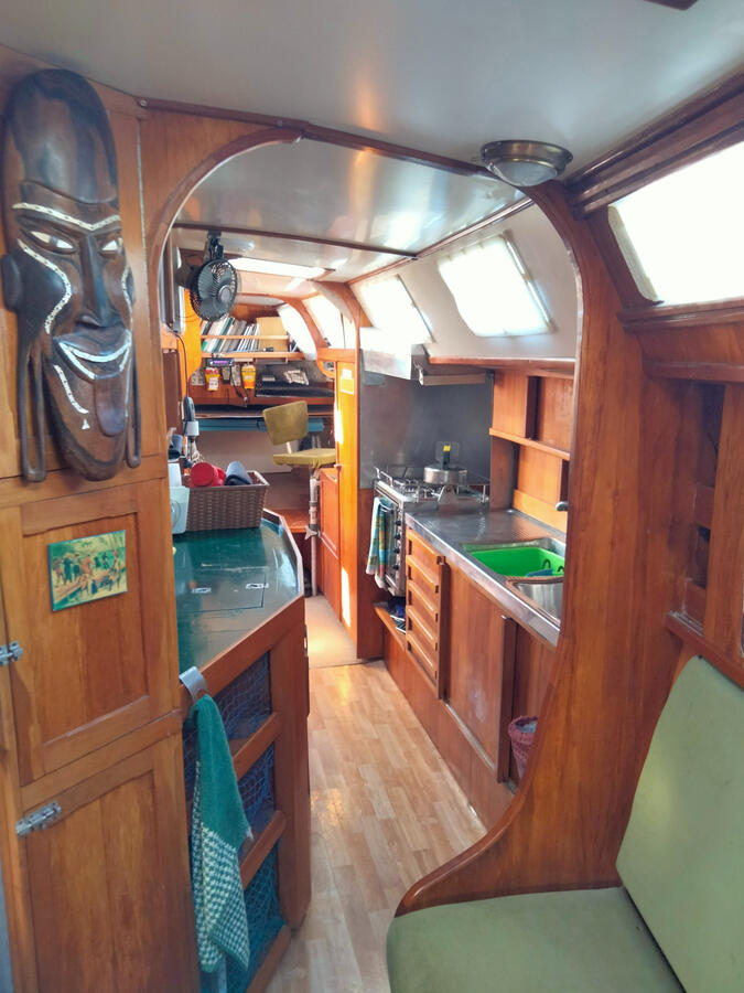 Looking aft from saloon through galley towards chart table