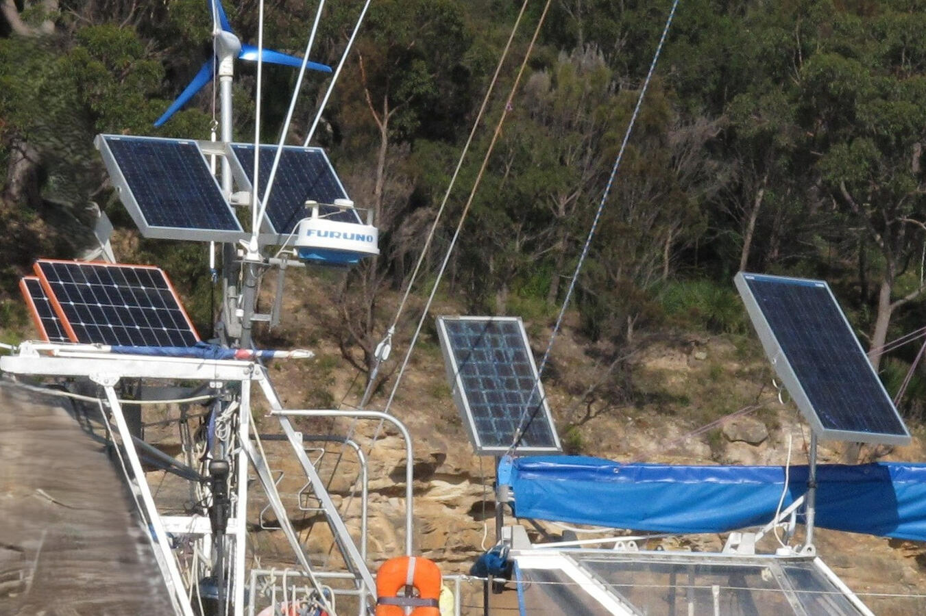 6 individually directable solar panels - all secure flat at sea. 6 individually directable solar panels - all secure flat at sea.